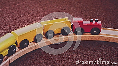 Wooden Train Toy on Curved Rail Stock Photo