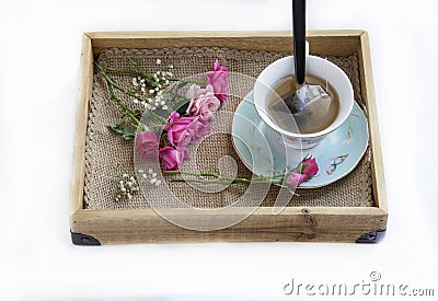 Wooden tray with teacup Stock Photo