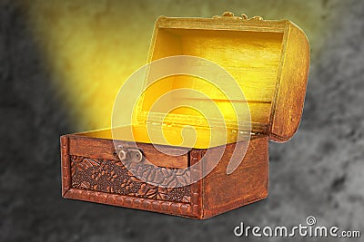 Wooden treasure chest with a magical wispy light coming out of t Stock Photo