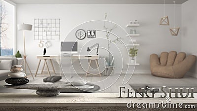 Wooden vintage table shelf with stone balance and 3d letters making the word feng shui over modern home corner office, zen concept Stock Photo