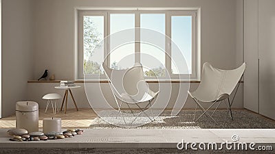 Wooden vintage table top or shelf with candles and pebbles, zen mood, over blurred empty minimalist white living room with panoram Stock Photo