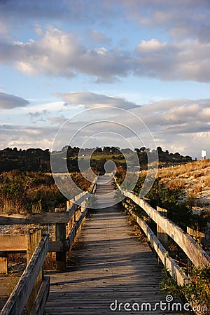 Wooden walkway from the beach Stock Photo