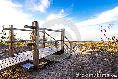 Wooden walkway on sand dune to beach. Stock Photo