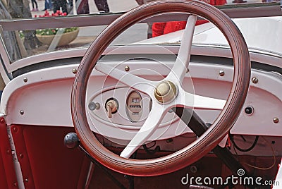 Wooden wheel of an old car Stock Photo