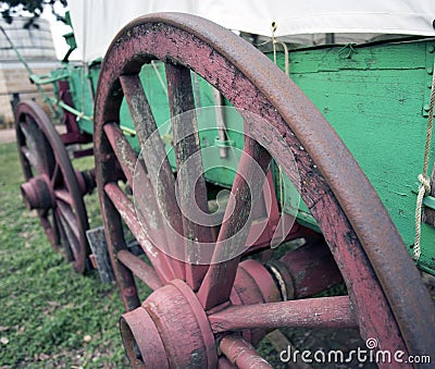 Largely un-restored wheels of a circa 1870 buckboard covered wagon Stock Photo