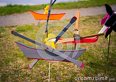 Wooden whirligig fisherman and boat Stock Photo