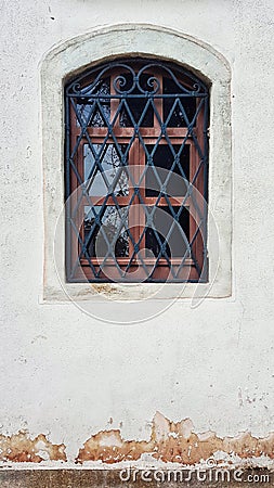 Wooden window frame and curved steel Stock Photo