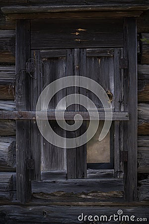 Wooden window of an old house in a small village Stock Photo