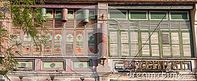 Wooden window shutters - famous local architecture in Georgetown, Penang, Malaysia. Editorial Stock Photo