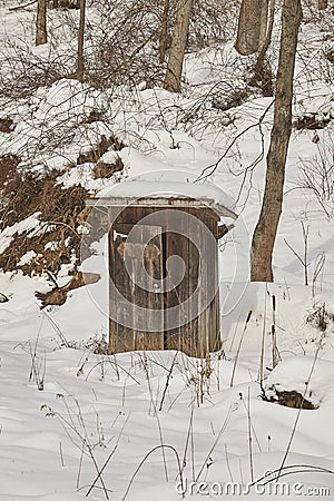 Privy after heavy snow fall Stock Photo