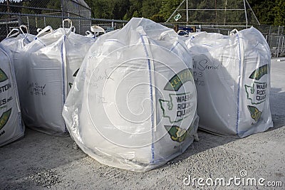 Woodinville, WA USA - circa May 2022: View of large bags of infill sand for a baseball field in a parking lot Editorial Stock Photo