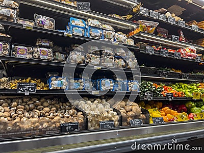 Woodinville, WA USA - circa September 2022: Close up view of produce for sale in the refrigerated section of a Haggen grocery Editorial Stock Photo