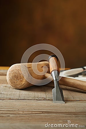 Woodworking tolls, chisels and mallet on workbench Stock Photo