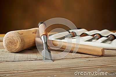 Woodworking tolls, chisels and mallet on workbench Stock Photo