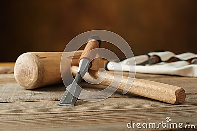 Woodworking tolls, chisels and mallet on workbench Stock Photo