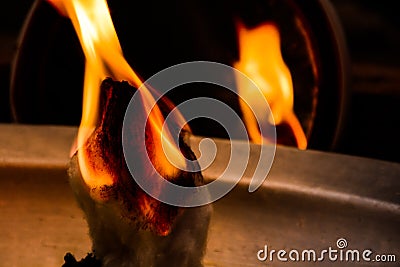 A Wool Grin Set on Fire in a Dramatic Way Stock Photo