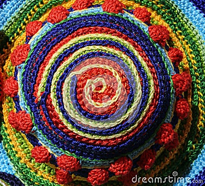 Threads woven together to form a colored spiral Stock Photo