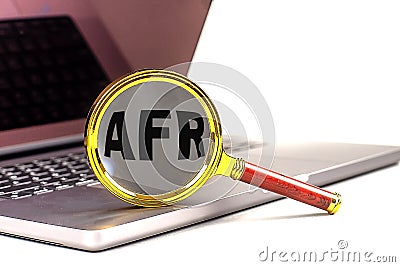 Word AFR on magnifier on laptop , business concept Stock Photo