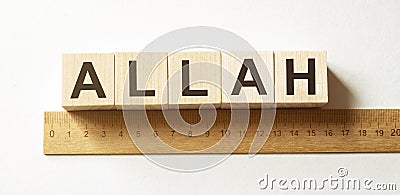 Word ALLAH made with wood building blocks Stock Photo