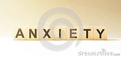 Word ANXIETY made with wood building blocks Stock Photo