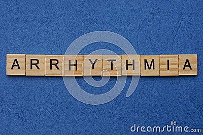 Word arrhythmia made from brown wooden letters Stock Photo