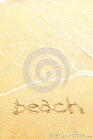 Word beach written in the sand of a beach Stock Photo
