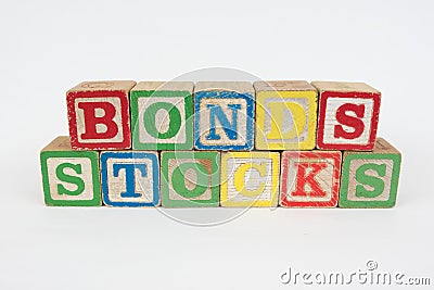 The Word Bonds and Stocks in Wooden Childrens Blocks Stock Photo