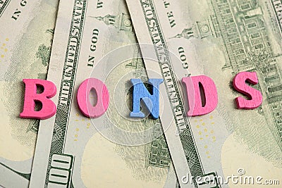 Word bonds at wooden letters Stock Photo