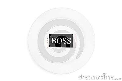 Word boss in the mobile phone on the plate on the white background. Top view. Stock Photo