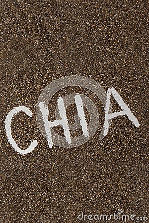 Word CHIA seeds background. Healthy superfood rich in Omega 3 fatty acids. Dry healthy natural ingredient. Vegetarian Stock Photo