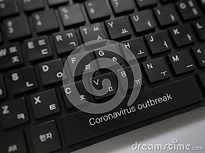 Word coronavirus outbreak on komputer keyboard. Selective focus. Stock Photo