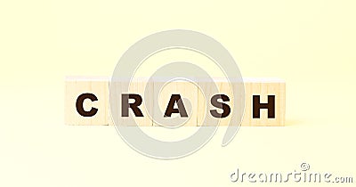 Word crash with black letters on wooden cubes against yellow Stock Photo