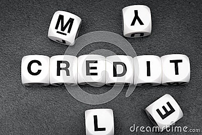 Word credit on toy cubes Stock Photo