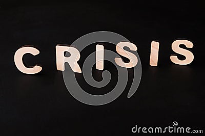 Word Crisis on black background Stock Photo