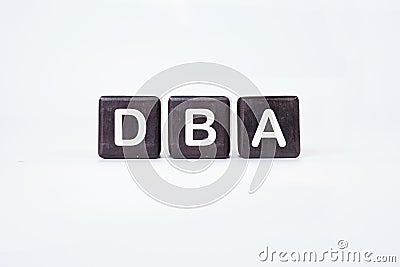 Word DBA (Database administrator) on cubes on a white background Stock Photo