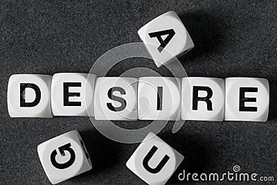 Word desire on toy cubes Stock Photo