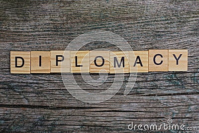 Word diplomacy made of brown wooden letters Stock Photo