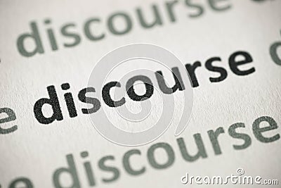 Word discourse printed on paper macro Stock Photo