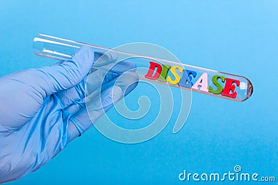 Word disease in test-tube holding a gloved hand Stock Photo