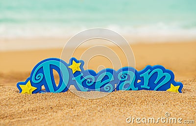 Word Dream on the sand Stock Photo