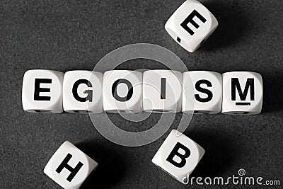 Word egoism on toy cubes Stock Photo