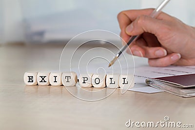 Word EXIT POLL composed of wooden letters. Stock Photo