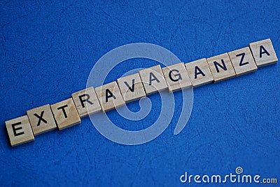 Word extravaganza made from brown wooden letters Stock Photo