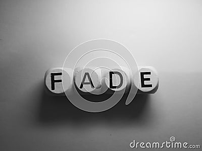 Word fade spelled on dice Stock Photo