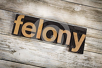 Felony Letterpress Word on Wooden Background Stock Photo