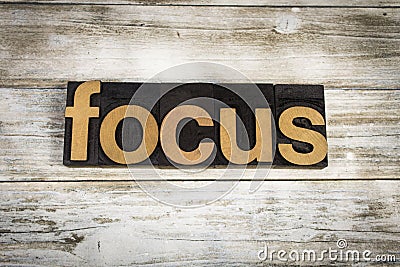 Focus Letterpress Word on Wooden Background Stock Photo