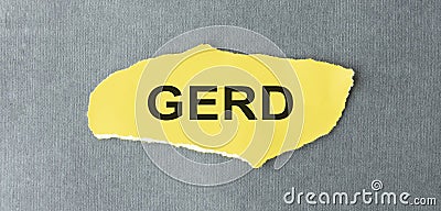 word GERD written on a yellow piece Stock Photo