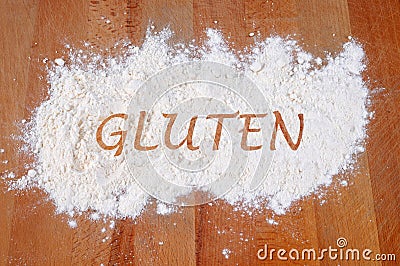 The word gluten written in flour Stock Photo