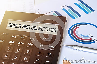 Word GOALS AND OBJECTIVES on calculator. Business and finance concept Stock Photo