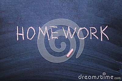 Word homework is written in chalk Stock Photo